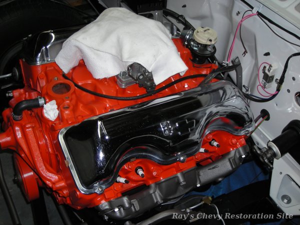 Photo of the exhaust manifolds, water pump, distributor, etc installed