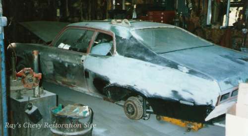Photo of my 74 Nova at the body shop with new quarter welded on