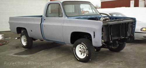 Photo of the truck in primer, no hood