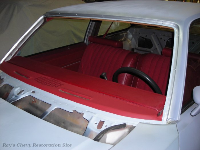 Freshly primed roof and painted upper dash.